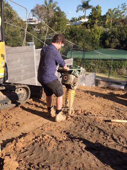 a jumping jack tamping rammer in action