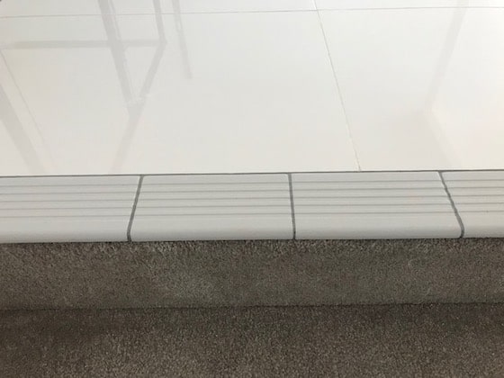 nosing tiles are ribbed tiles at the edge of stairs that prevent accidents